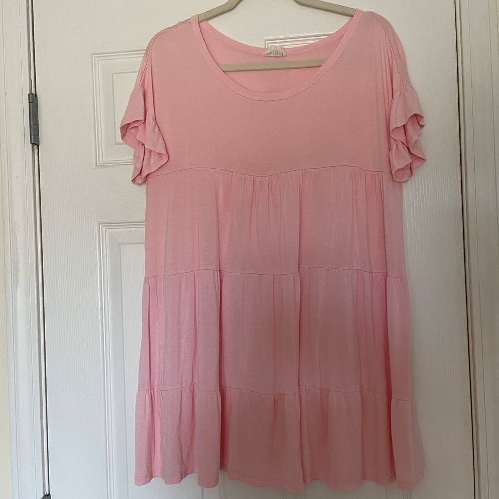 This pink blouse is super cute and light!!!
